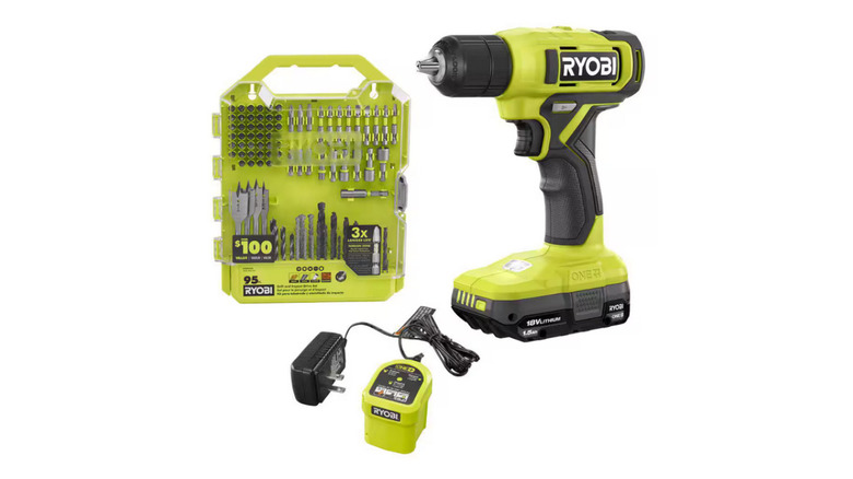 The 3/8" Ryobi drill/driver with a battery and a kit of drill and driver bits