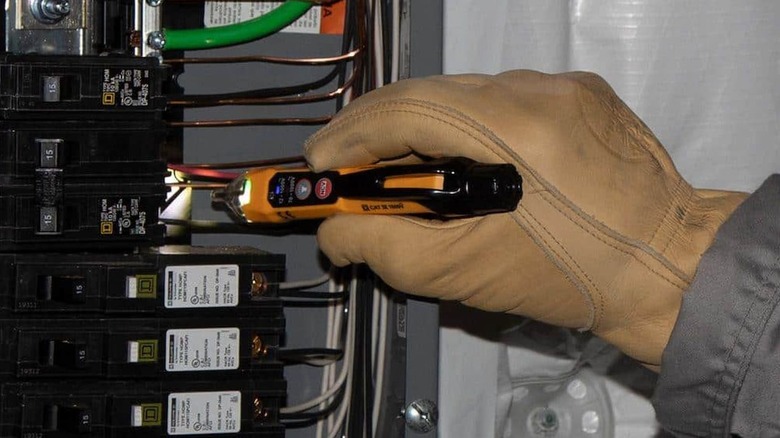 A Klein Tools Dual Range Non-Contact Voltage Tester shaped like a pen.