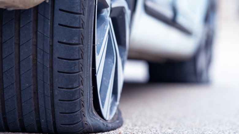 A close-up of a flat tire