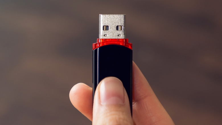 USB flash drive in hand