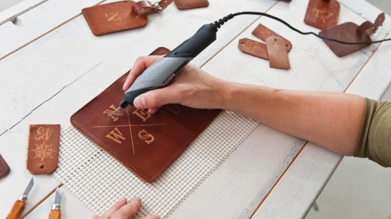 person using Dremel Stylo+ Corded Rotary Tool Kit