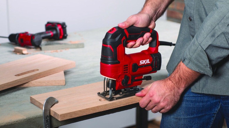 man using Skil Variable Speed Keyless Jigsaw