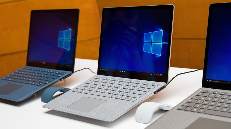 Several Windows laptops placed next to one another