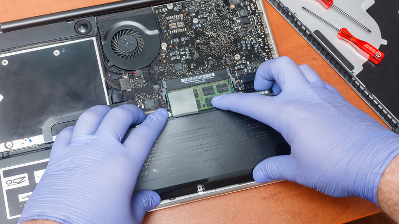 A MacBook being repaired