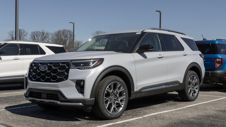 A gray Ford Explorer parked in a lot