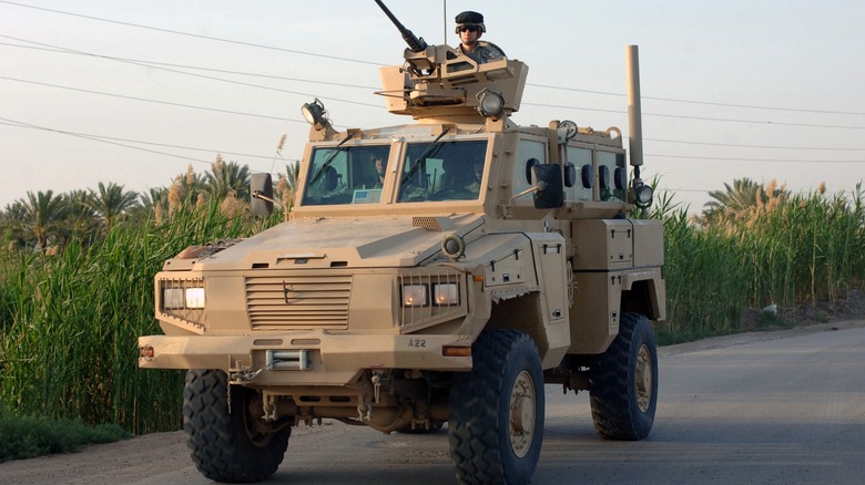 rg-31 nyala charger driving armored vehicle