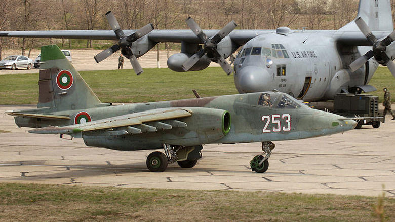 BAF Su-25 and US C-130 parked on concrete