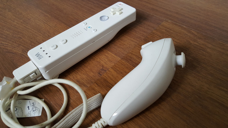 The Wiimote and Nunchuk on a wooden surface