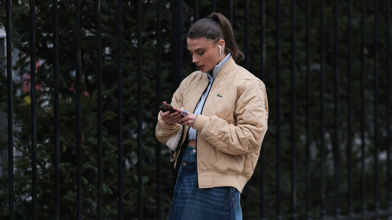 woman listening to music airpods