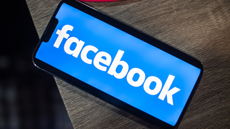 Facebook logo on a smartphone