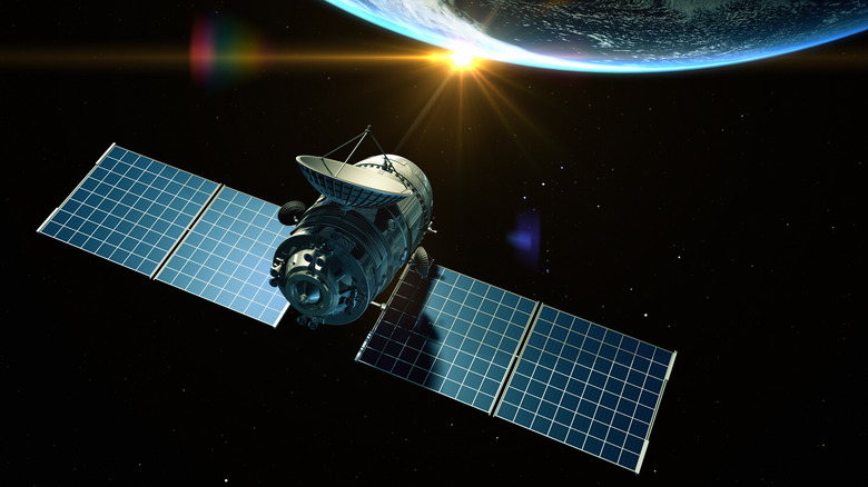 solar panels on orbiting satellite