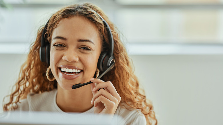 woman using wireless headset