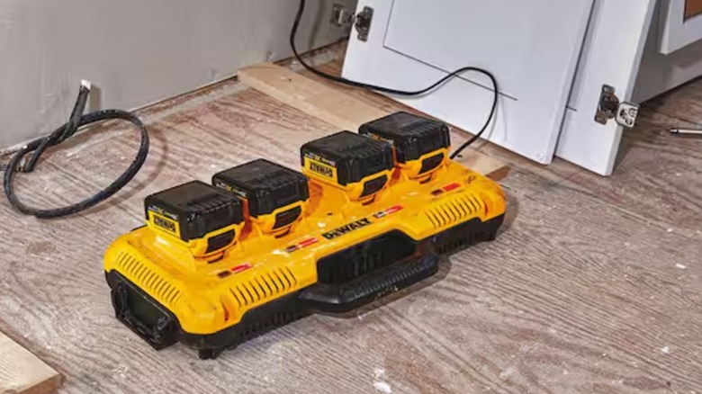 four port charger charging up batteries