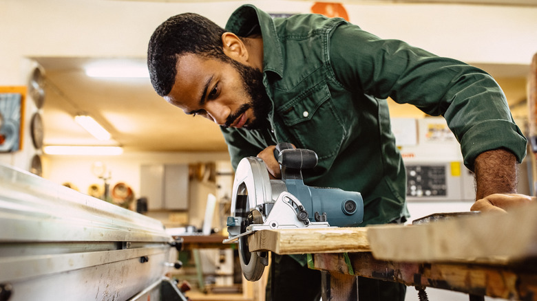 Carpenter works on project