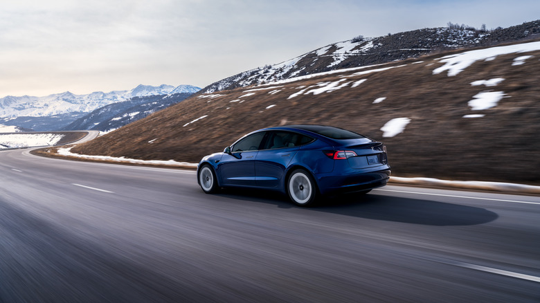Tesla Model 3 on remote road
