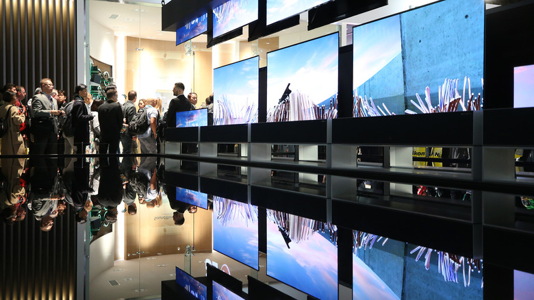 Several OLED TVs on display