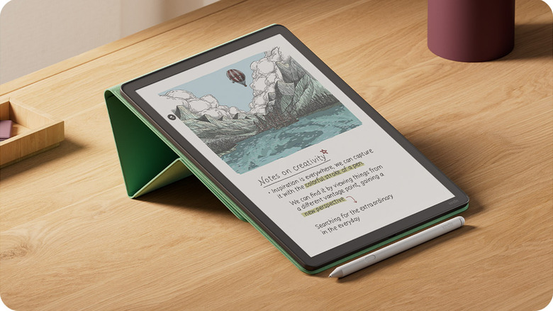 Taking notes on an Amazon Kindle Colorsoft e-reader with an image of a lake on it