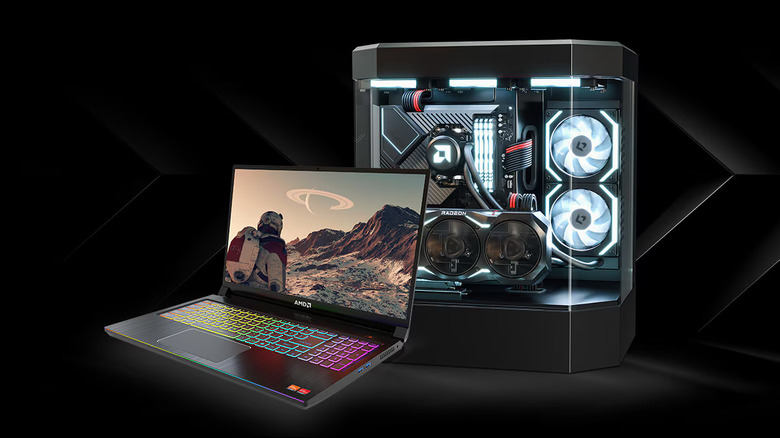 A video game running on a laptop, next to a computer unit