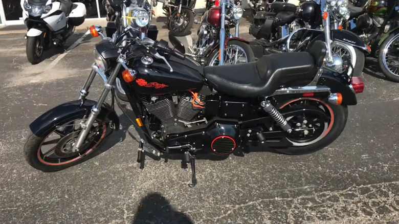 A 1991 Dyna Glide Sturgis being displayed on a public road