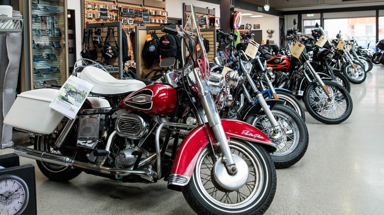 Different Harley-Davidson models parked inside a Harley-Davidson showroom