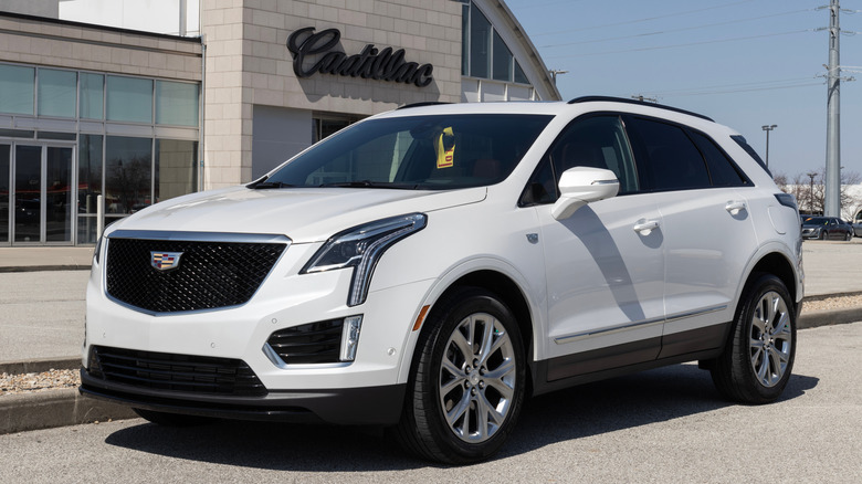 A white Cadillac XT5 parked