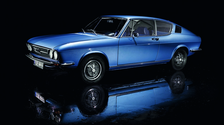 Blue 1970 Audi 100 Coupe S studio shot front 4/3 view