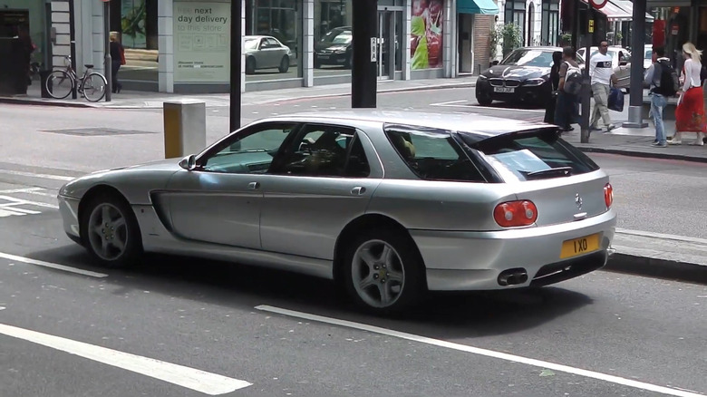 1993 Ferrari 456 GT Venice driving on London streets rear 3/4 view