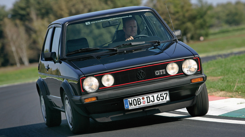Volkswagen Golf GTI Mk1 cornering on the track front view