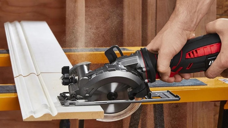 cutting baseboard with Bauer circular saw