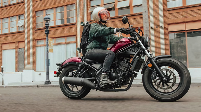 Woman riding a Honda Rebel 300