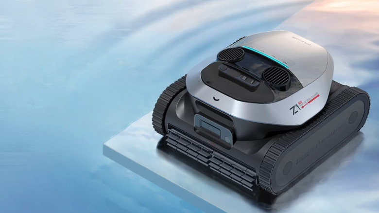 Closeup of Dreame Z1 Pro pool robot next to pool.