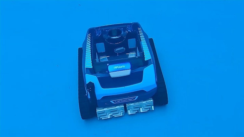 Polaris Freedom robot cleaning pool underwater.