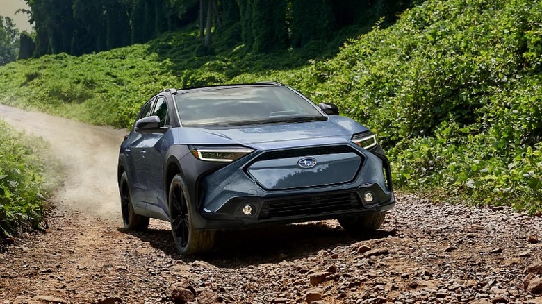 A 2025 Subaru Solterra on a dirt road