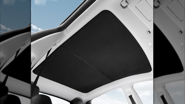 A BASENOR branded sunshade for the Tesla Model Y