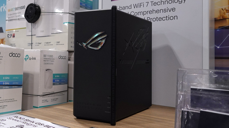 Asus ROG Strix router on a table.