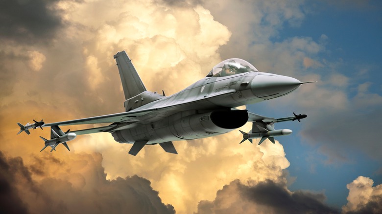 F-16 Fighting Falcon against dramatic clouds