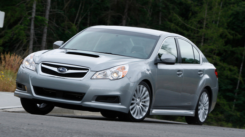 2012 Subaru Legacy GT cornering at speed front 3/4 view