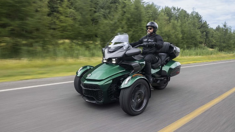 Green Can-Am Spyder F3 on the road