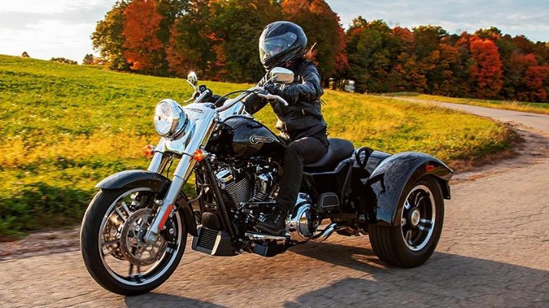 Black Harley-Davidson Freewheeler on the road