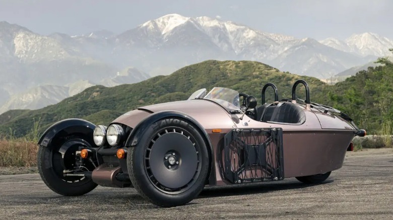Bronze Morgan Super 3 parked in the mountains