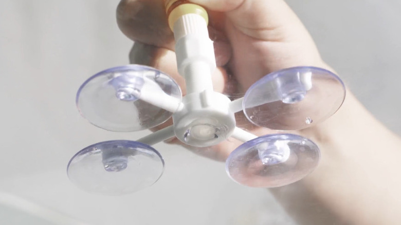 Windshield repair tool used on glass