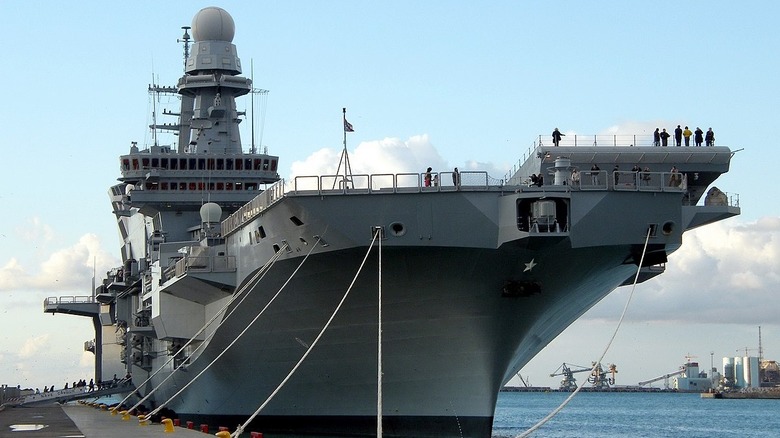 Italian aircraft carrier Cavour moored at dock
