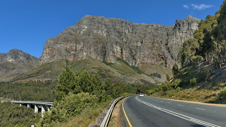 A car on the mountainous Cairo–Cape Town Highway.