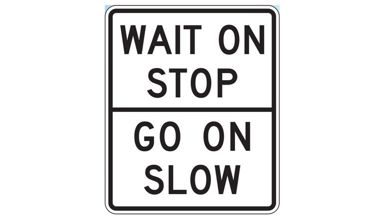 Wait on stop/go on slow sign