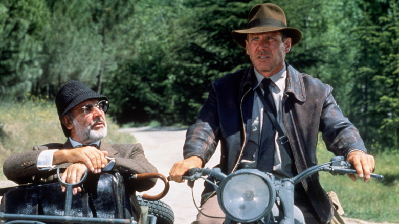 Harrison Ford and Sean Connery in a sidecar motorcycle