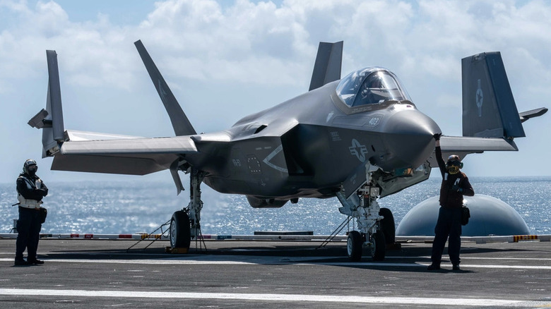 F-35C Lightning II landing on an aircraft carrier in 2023