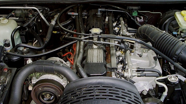 A clear view of the 4.0L Inline-6 engine beneath the hood of a vehicle.