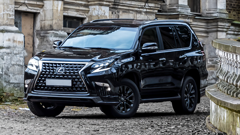 Lexus GX 460 by derelict mansion