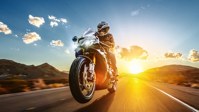 Motorcycle rider on open road