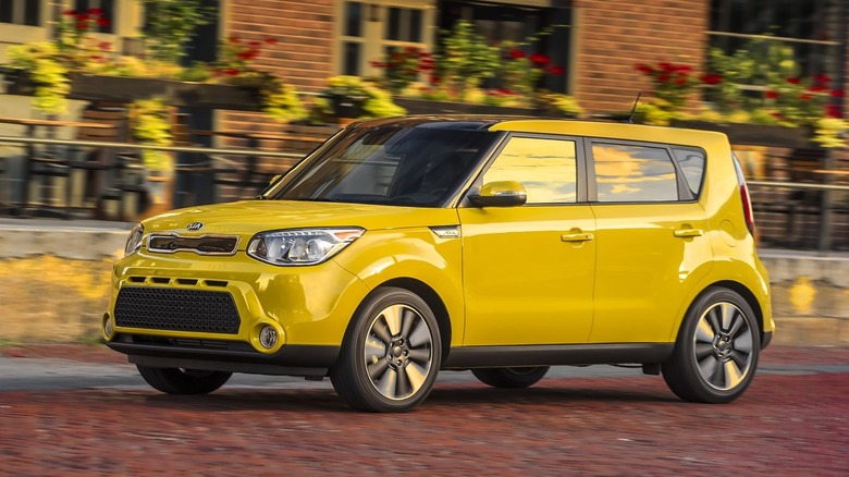 2016 Kia Soul in yellow parked on a street